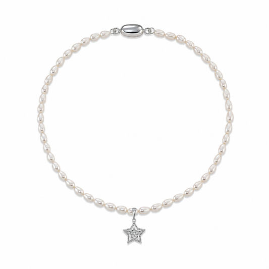 White oval freshwater pearl necklace with silver star pendant