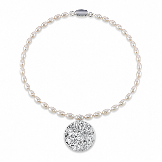 White freshwater oval pearl necklace with round glitter pendant and small clasp
