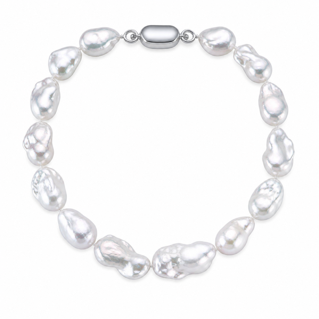 White baroque freshwater pearl necklace with silver-tone oval clasp and smooth oval pearls