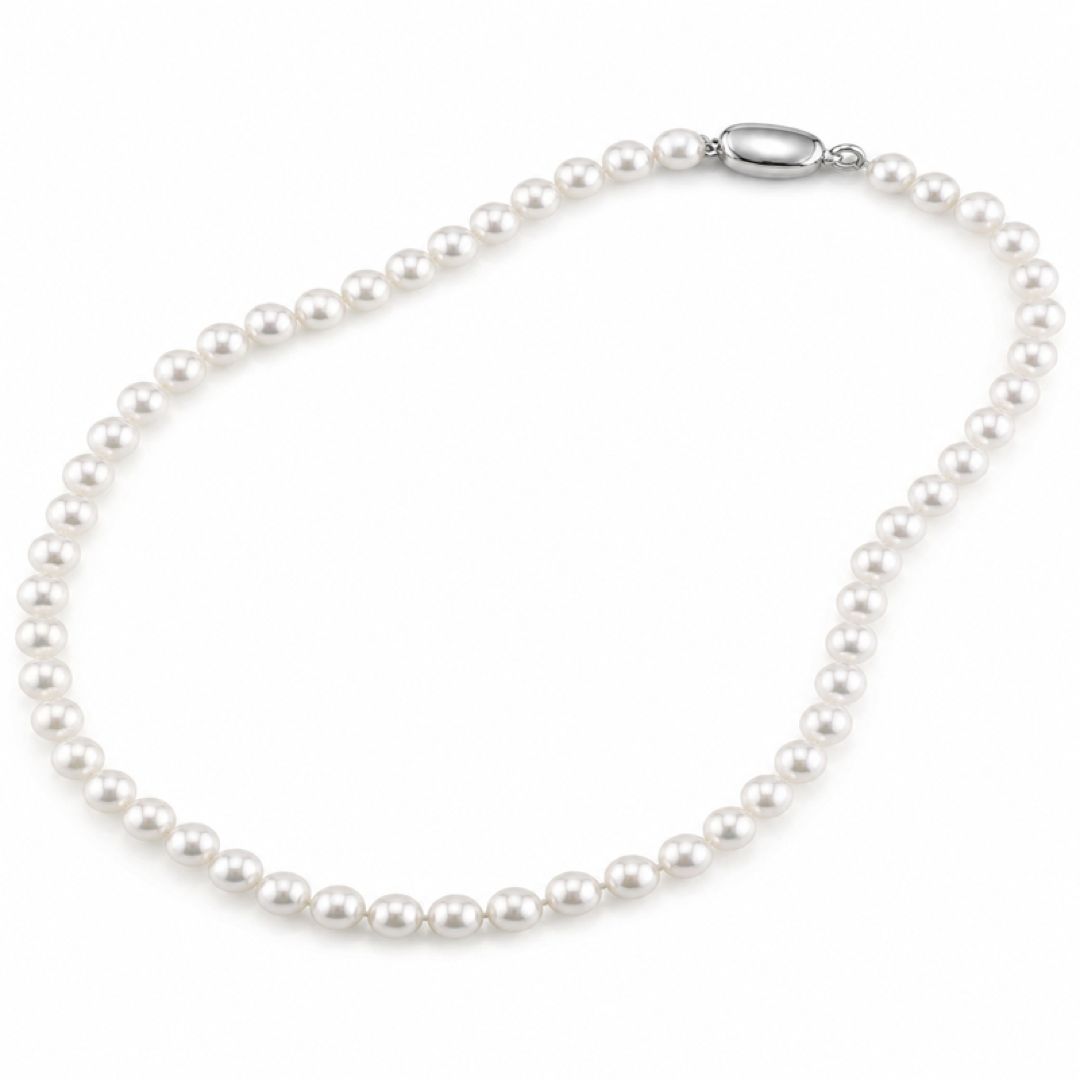 White pearl necklace with round pearls and silver clasp