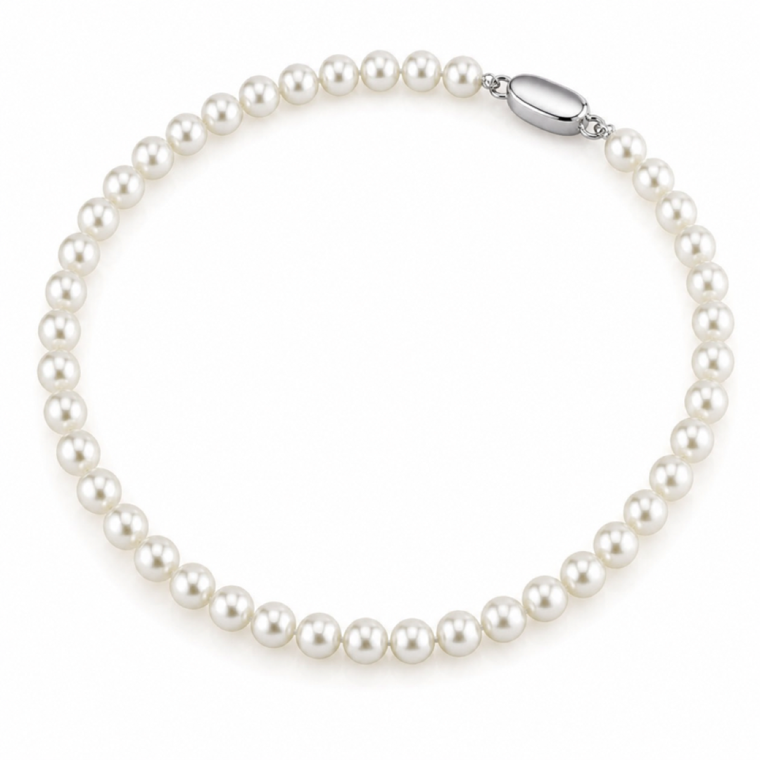White pearl necklace with round beads and silver-toned clasp