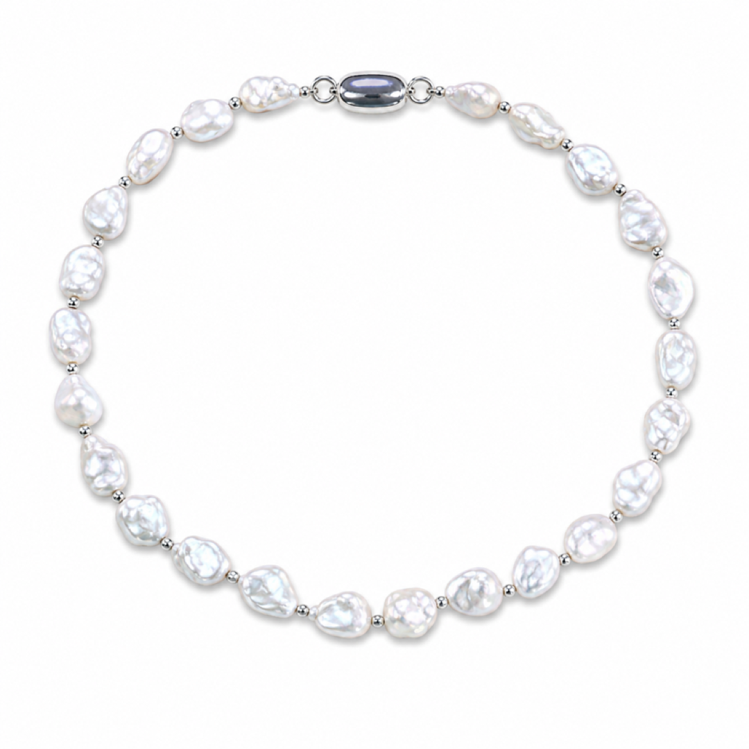 White keshi pearl necklace with silver links and oval purple clasp.