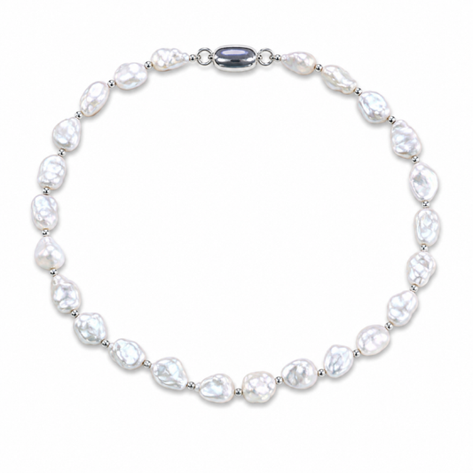 White keshi pearl necklace with silver links and oval purple clasp.