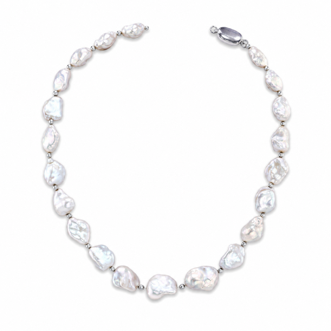 White keshi pearl necklace, rounded pearls on silver chain with clasp ends.